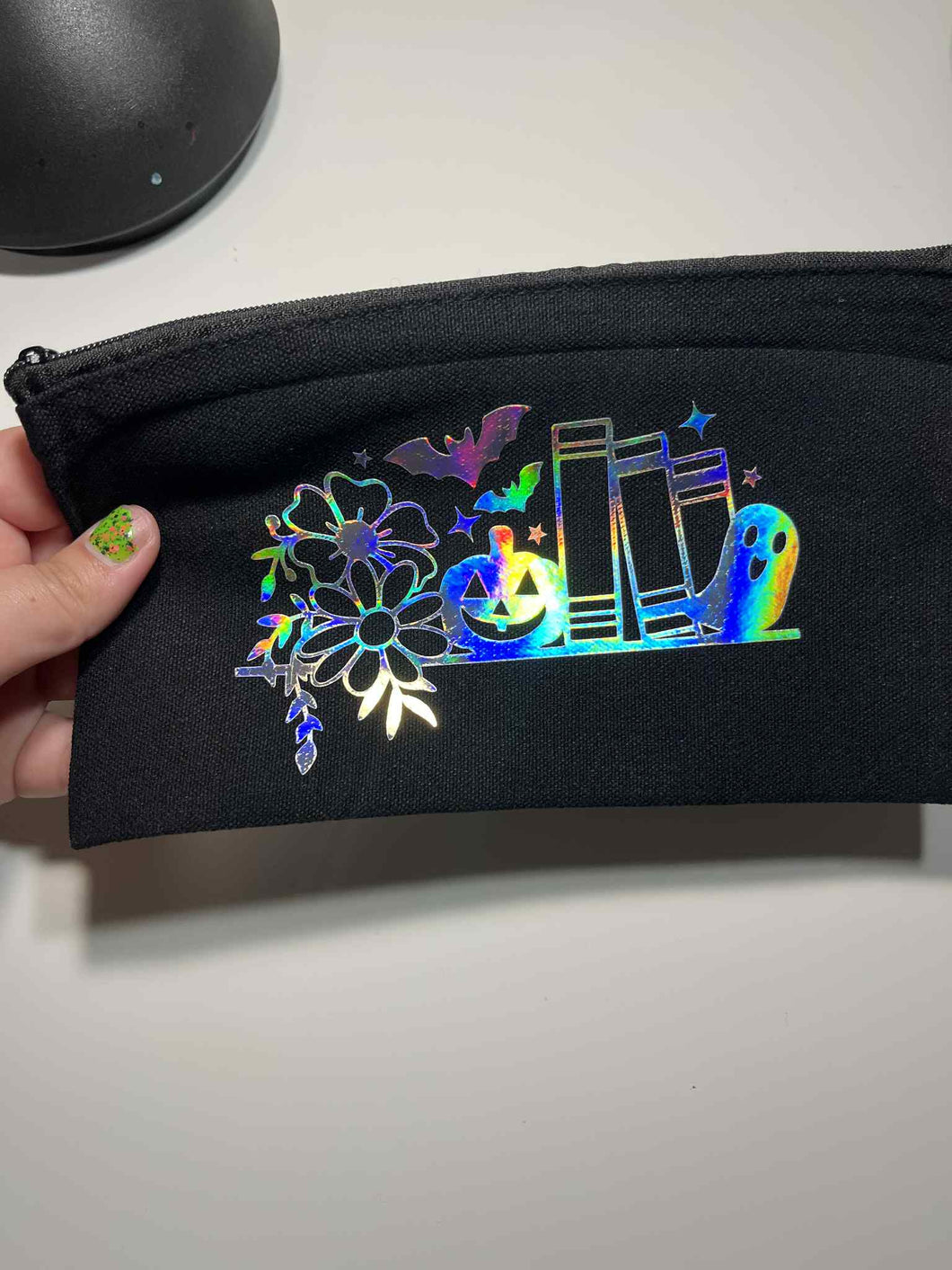 Jessenia’s Cricut Creations - Haunted Bookshelf Zipper Pouch